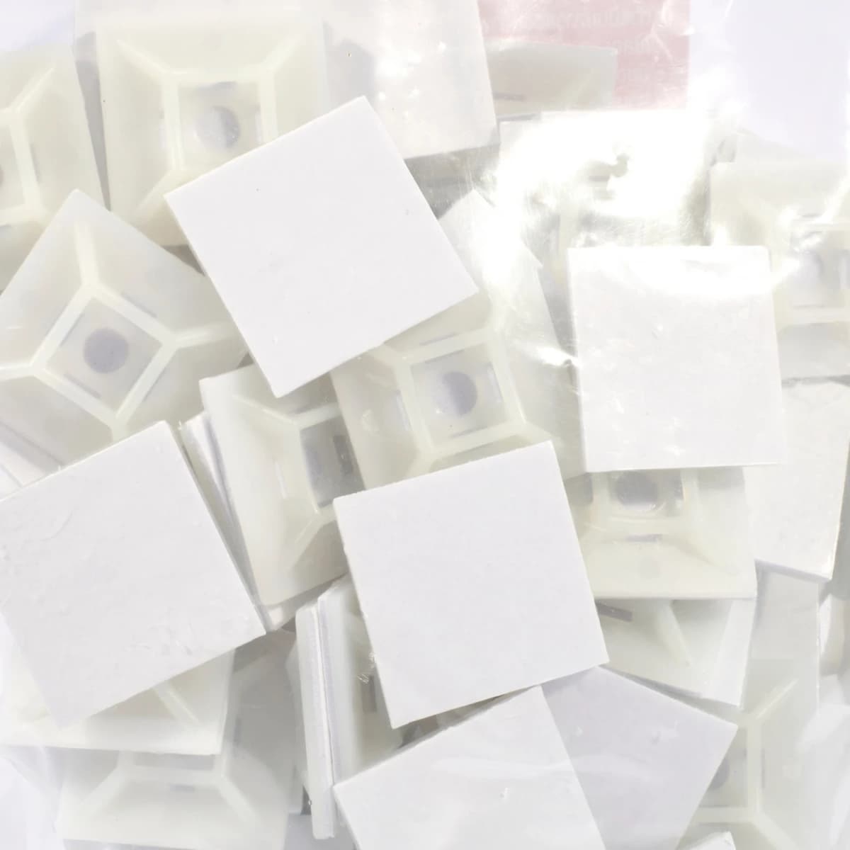 POLO แป้นกาว สีขาว 1 นิ้ว รุ่น PL-HW4A ผลิตจากไนลอน ใช้งานร่วมกับสายรัดเคเบิ้ลไทร์ บรรจุ 100 ชิ้น/แพ็ค (โปโล)